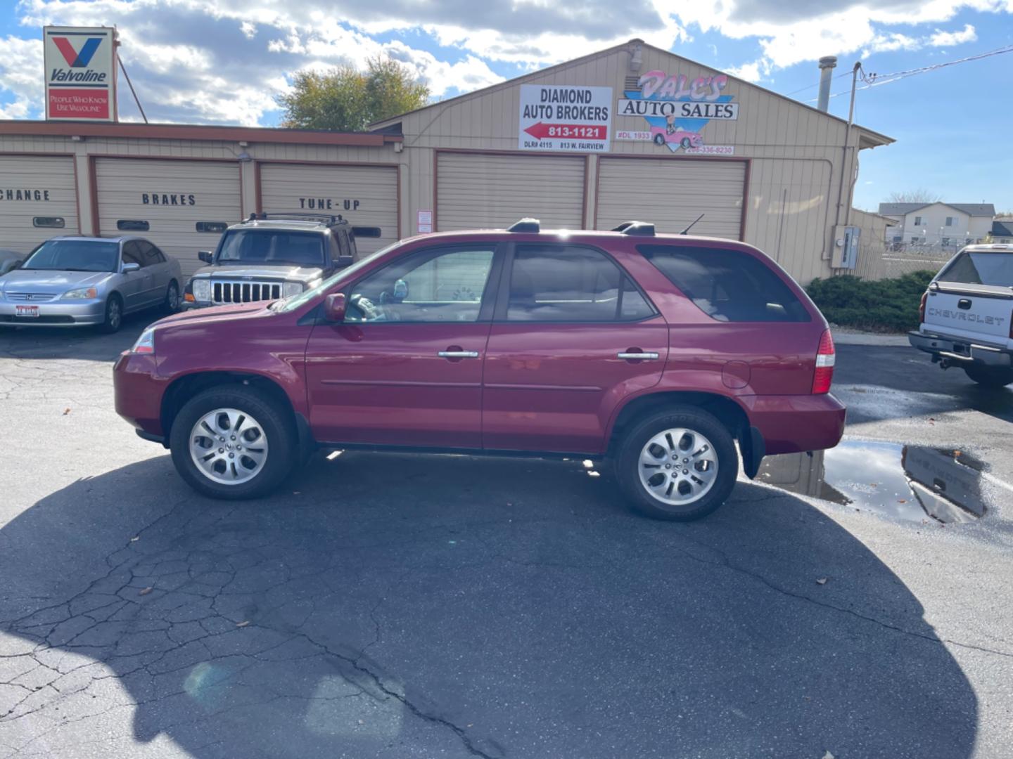 2003 Maroon /Tan Acura MDX Touring (2HNYD18923H) with an 3.5 V6 engine, AT transmission, located at 813 E Fairview Ave, Meridian , ID, 83642, (208) 336-8230, 43.618851, -116.384010 - Photo#0